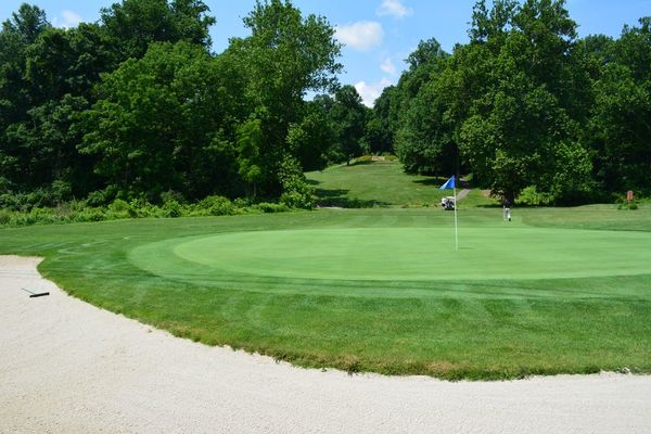 A sand trap next to a hole at Chapel Hill